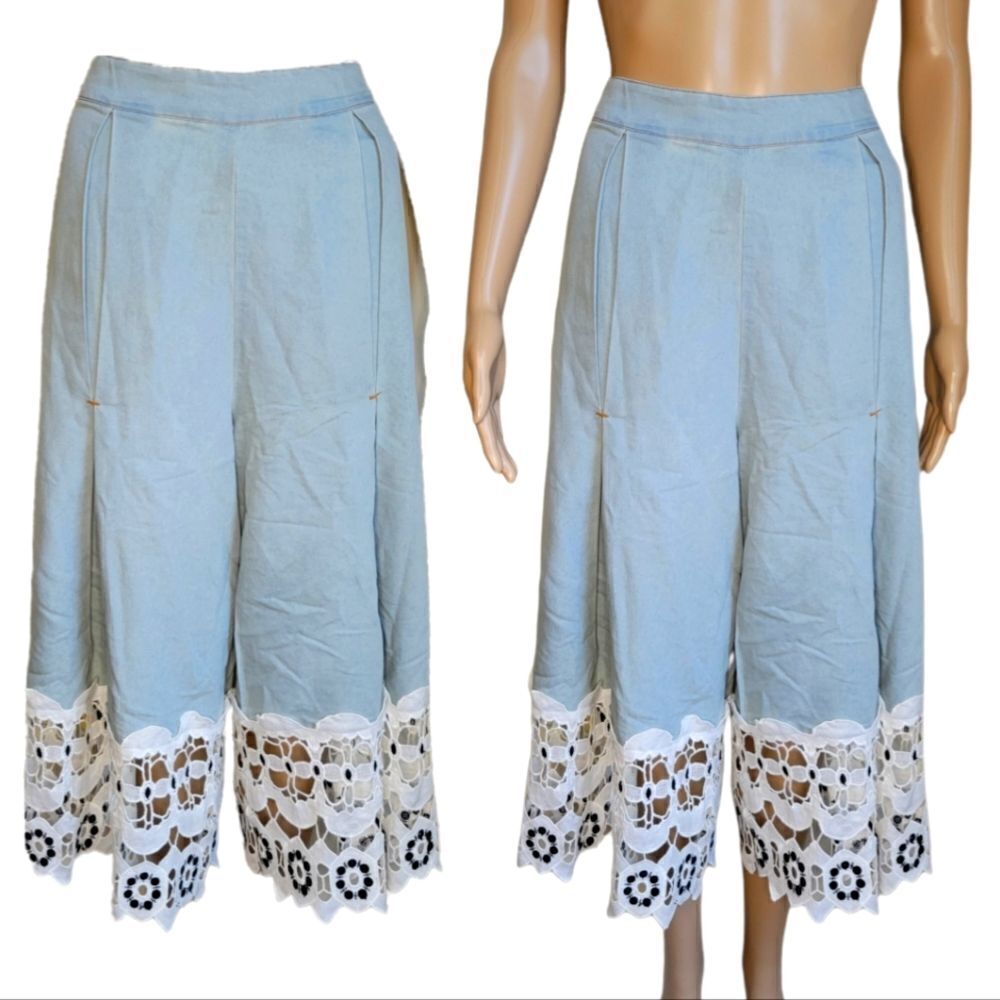 Rehab light weight denim pants with White crochet trim at hem and wide leg.